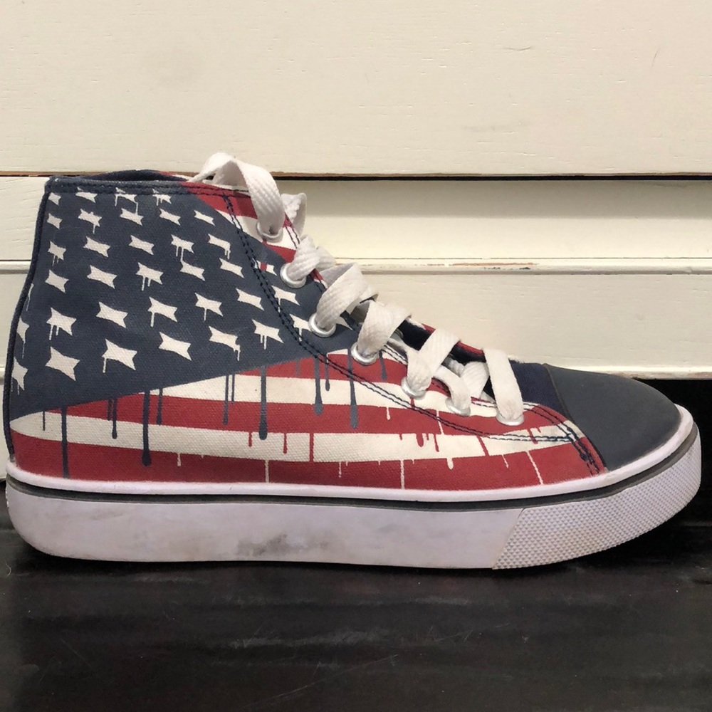 Size 5 Heelys, red, white, and blue.